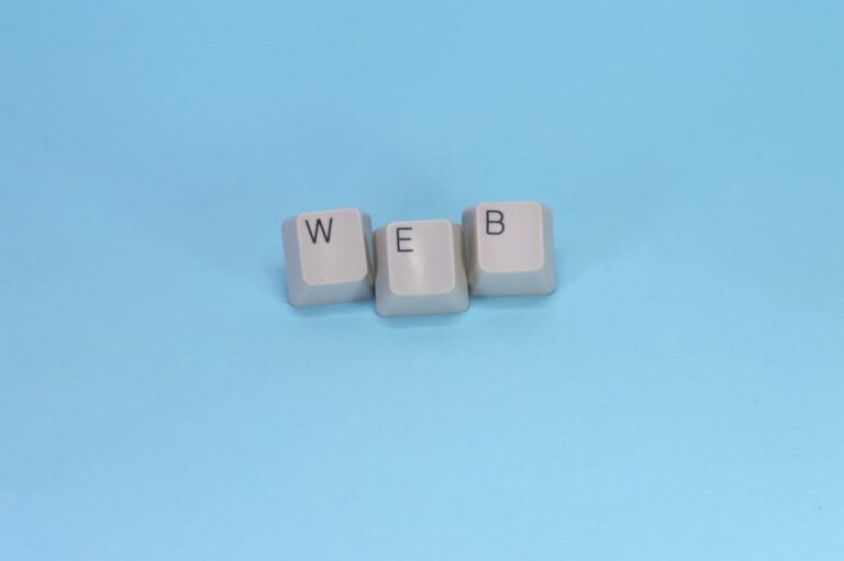 Keyboard keys spell out the word "web."