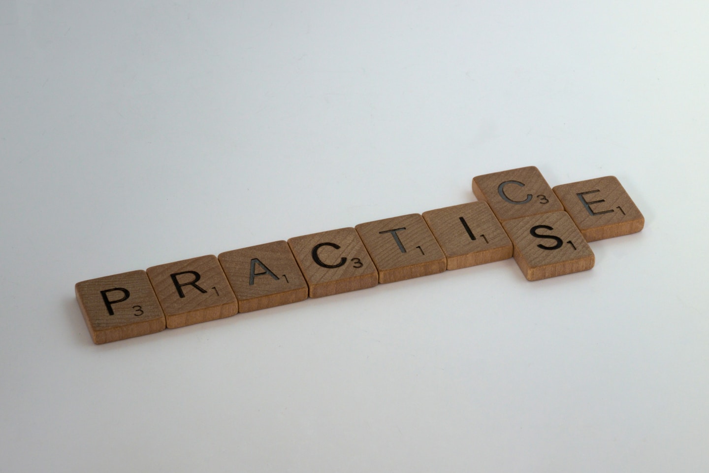 scrabble, scrabble pieces, lettering, letters, white background, wood, scrabble tiles, wood, words, practice, practise, do, train, practise what you preach,
